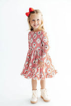 Santa's Sweet Shoppe Ruffle Hem Twirl Dress LS