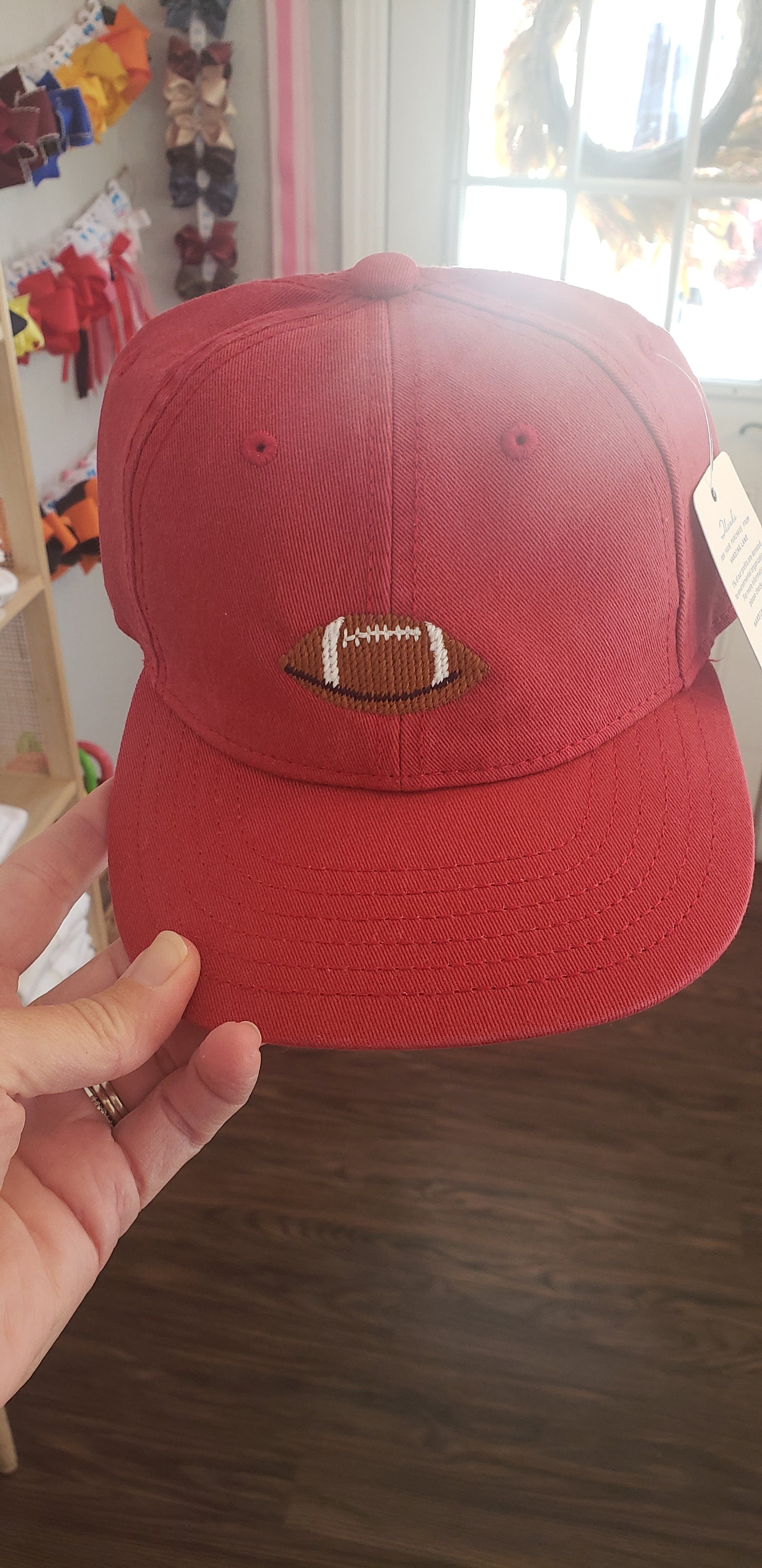 Weathered red football hat